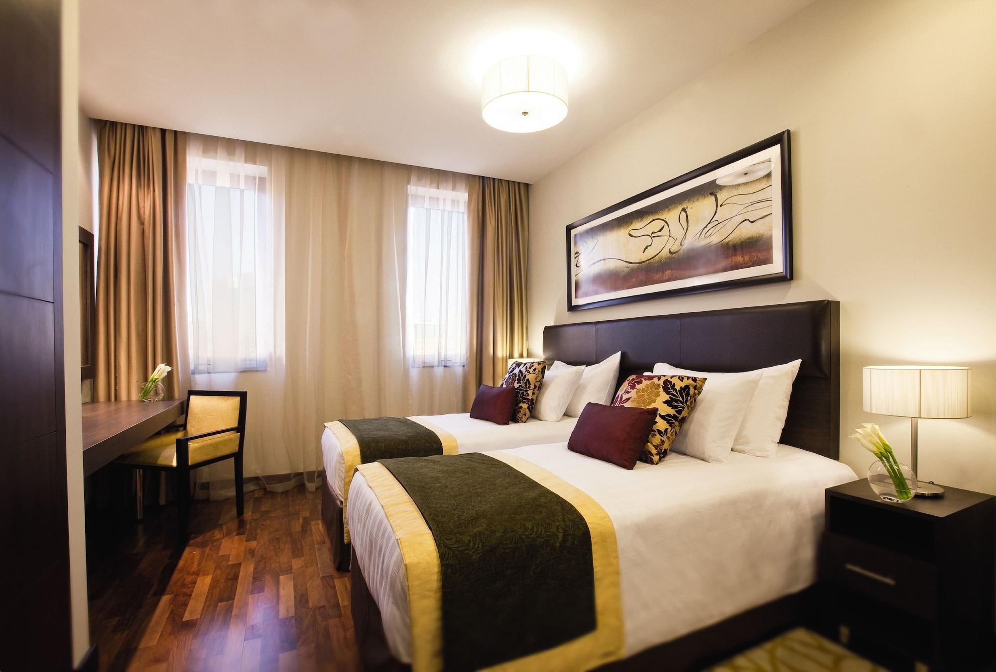 Moevenpick Hotel Apartments Al Mamzar Dubai Exterior foto Deluxe Room