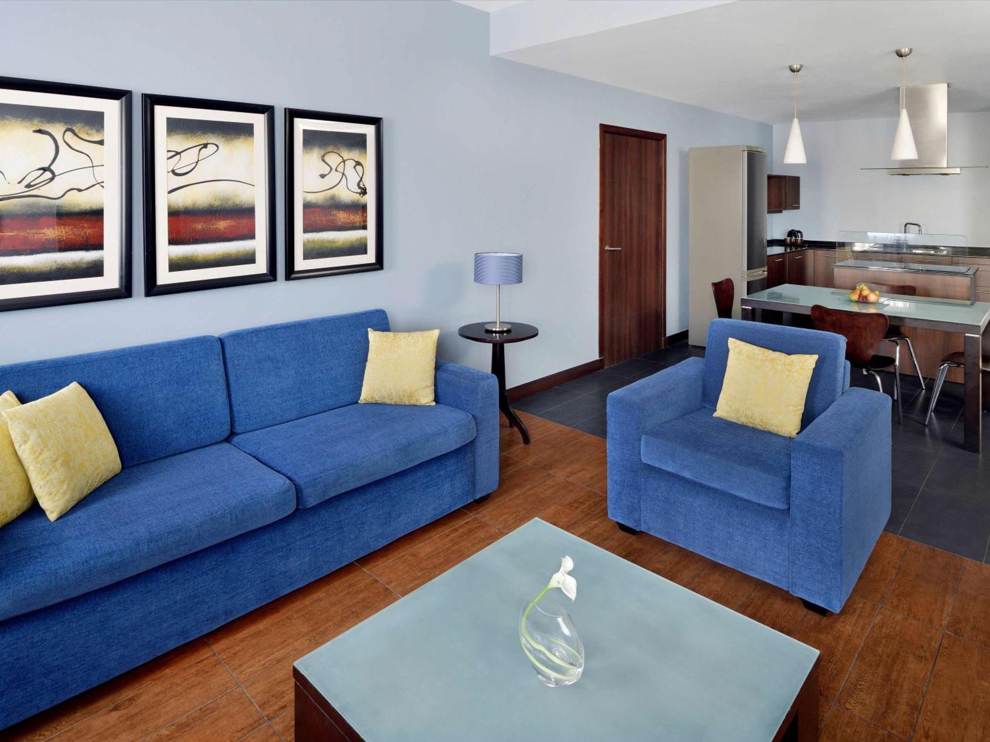 Moevenpick Hotel Apartments Al Mamzar Dubai Exterior foto A typical apartment at the complex