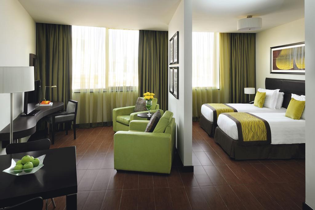 Moevenpick Hotel Apartments Al Mamzar Dubai Exterior foto A typical room at the hotel